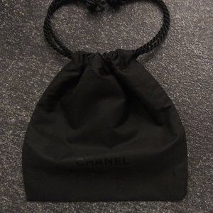 Chanel Black Pouch 4" x 4" with satin braided draw cord. Mini Wrist Pocketbook